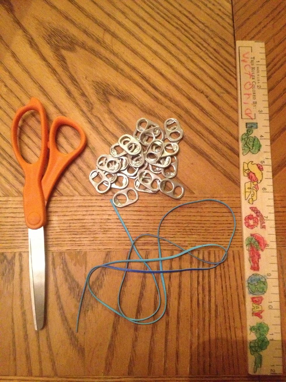 Take your lanyard lace and measure 36 inches, cut with scissors. You will need 22 to 28 soda tabs depending on your wrist size.