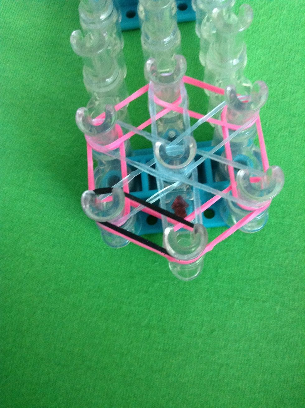 Take your last color of rubber band bands and do the same thing we did on the bottom all the way around