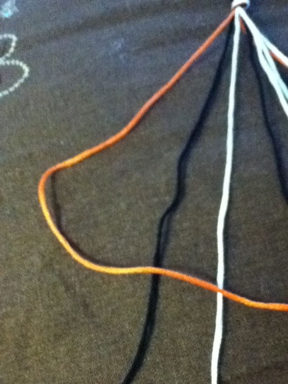 Take your left most (border) thread and make a "4" with the next thread.