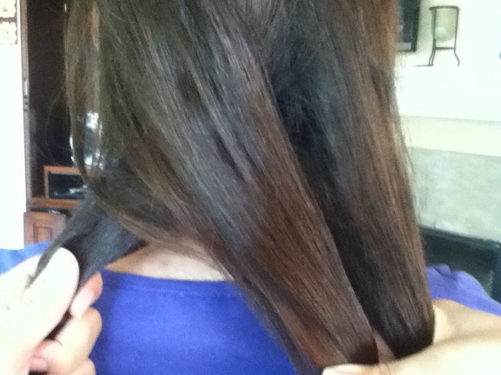 Take your left side strand and place it in the middle. Don't let go of your hair.