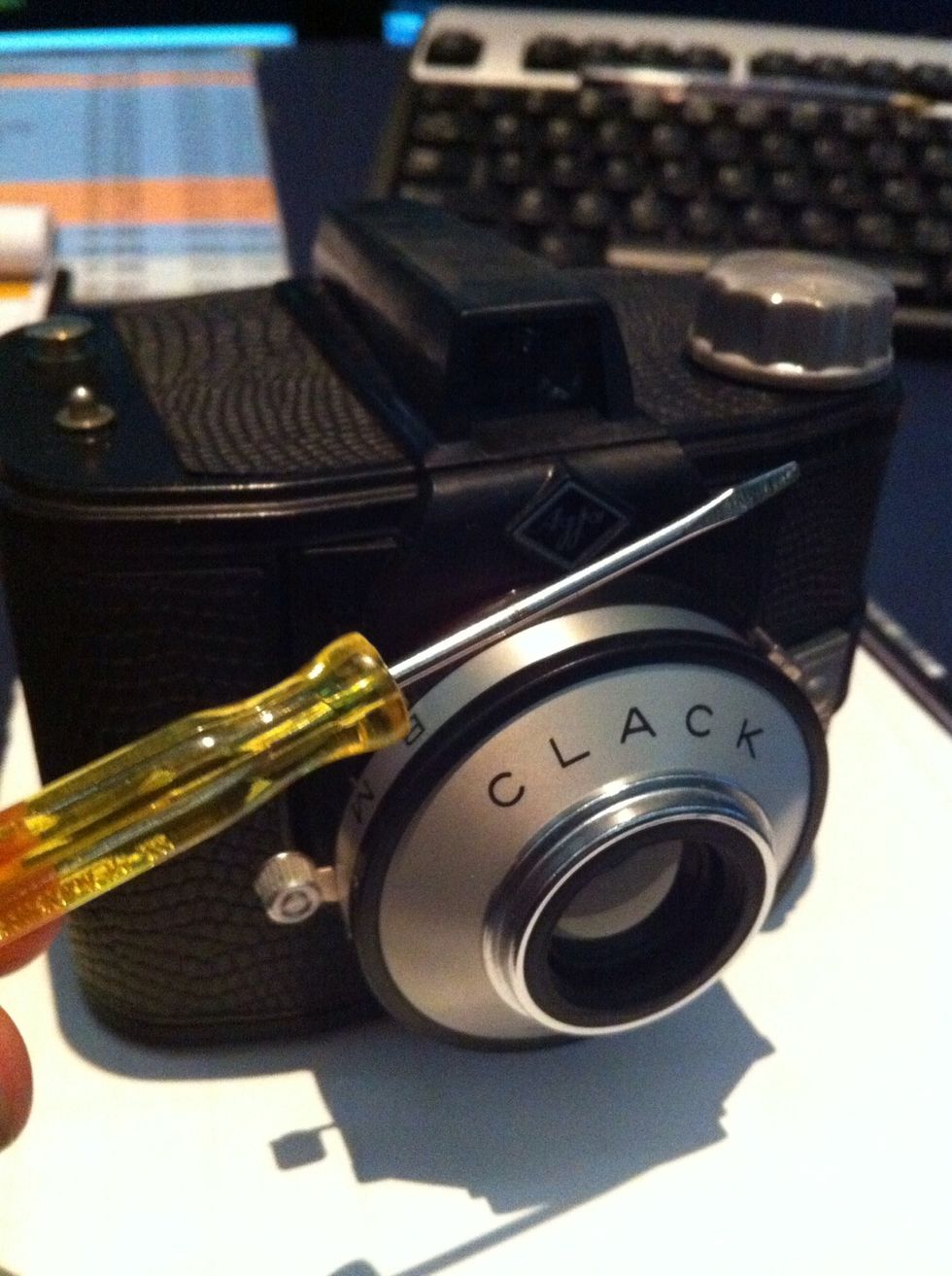 Take your little flat head screwdriver and a well lit area