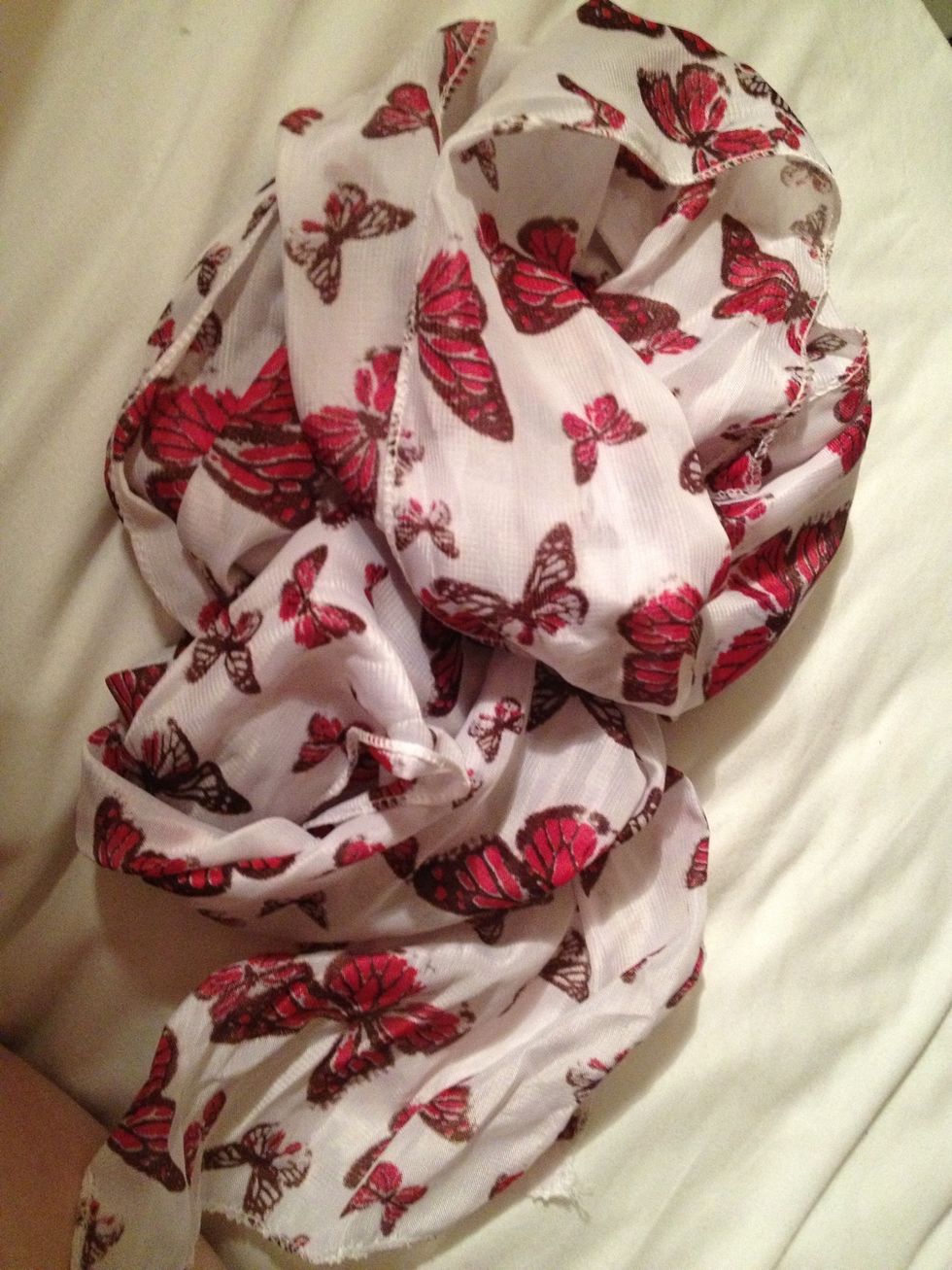 Take your material, mine is an old scarf, it needs to be longer and wider then the cuff,,