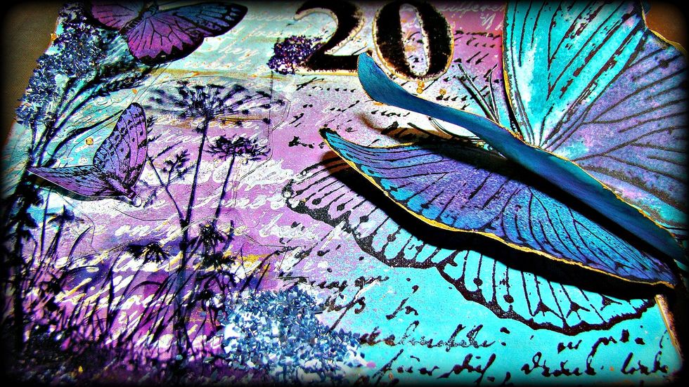 Take your Metal Effects Gold and edge your chipboard numbers and edges of your butterfly wings.