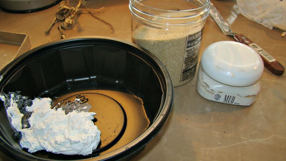 Take your Mud Texture Paste and mix some craft sand for some texture.