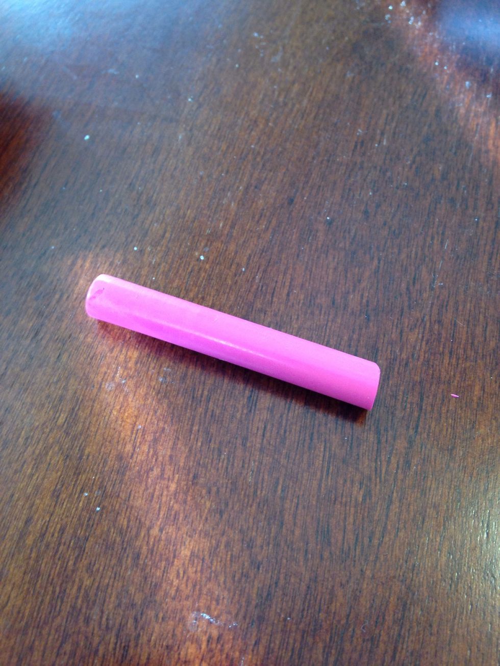 Take your naked crayon and smash it into shards. I like to roll a rolling pin over them in a plastic bag, but this time I just used my nail to shave a few chunks off the end.