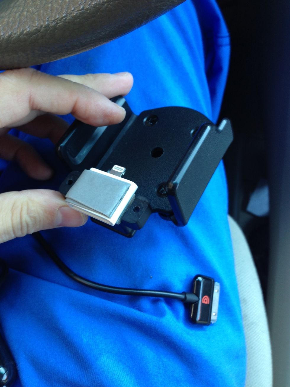 Take your new lightning to 30-pin connector and look at where it sits. I suggest plugging it into your phone and putting your phone in the cradle to see where it rests.