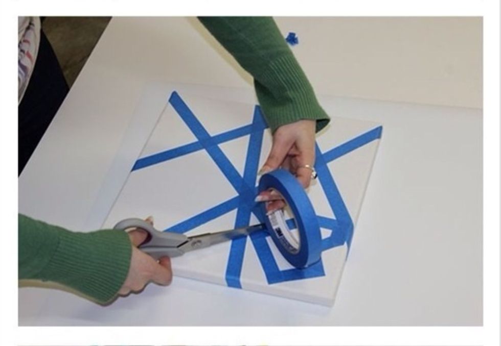 Take your painters tape or electrical tape and cut off pieces of tape in random designs. If you want you can put a sort of heart or star design into your painting. Do NOT use normal scotch tape!