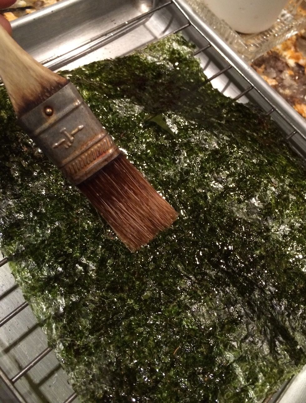 Take your pastry brush and put a thin coat of olive oil on it...Just enough to barely wet it so that salt will stick to it.