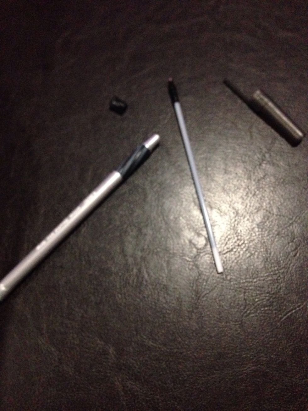 Take your pen apart. Ball point pens are easy to take apart. Use your nails or even teeth. You can use skinny items to shimmy it out to pull the back out.