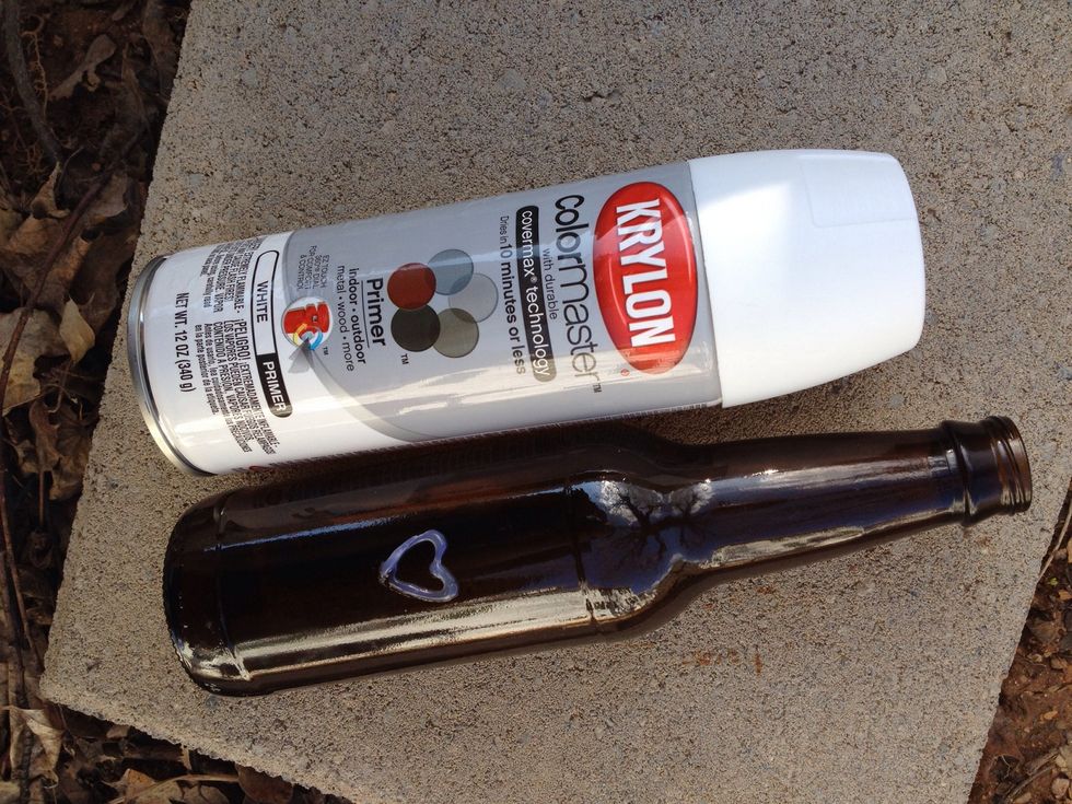 Take your primer and bottle outside or to a well ventilated area for spraying.