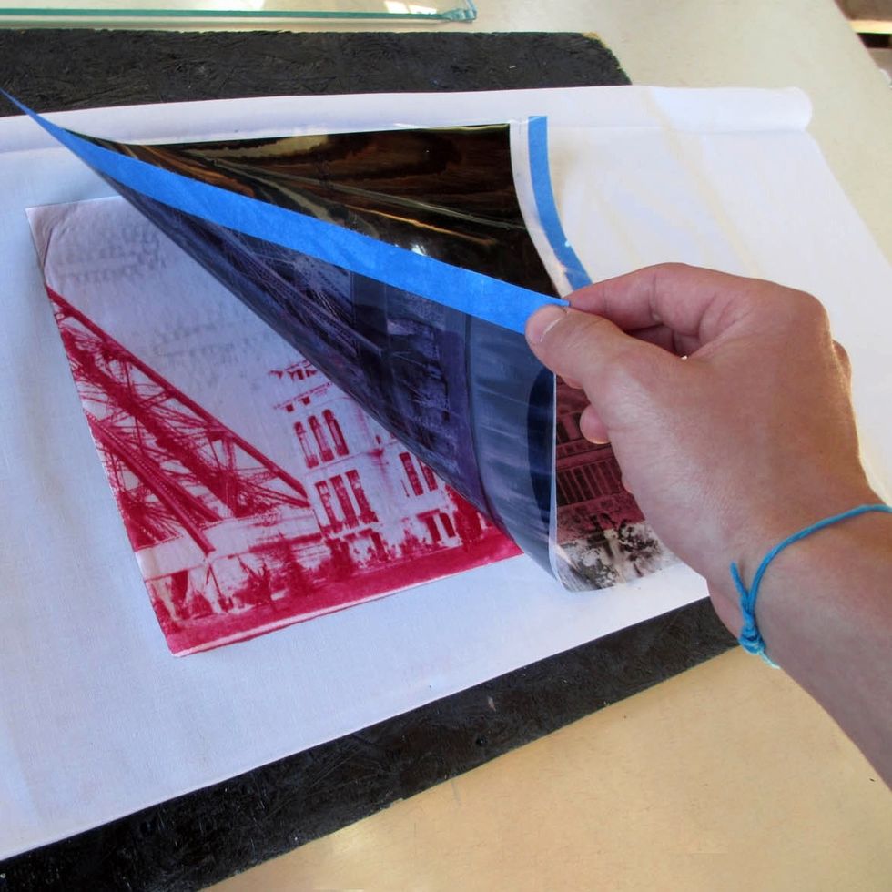 Take your print back indoors and remove the negative to reveal your print!