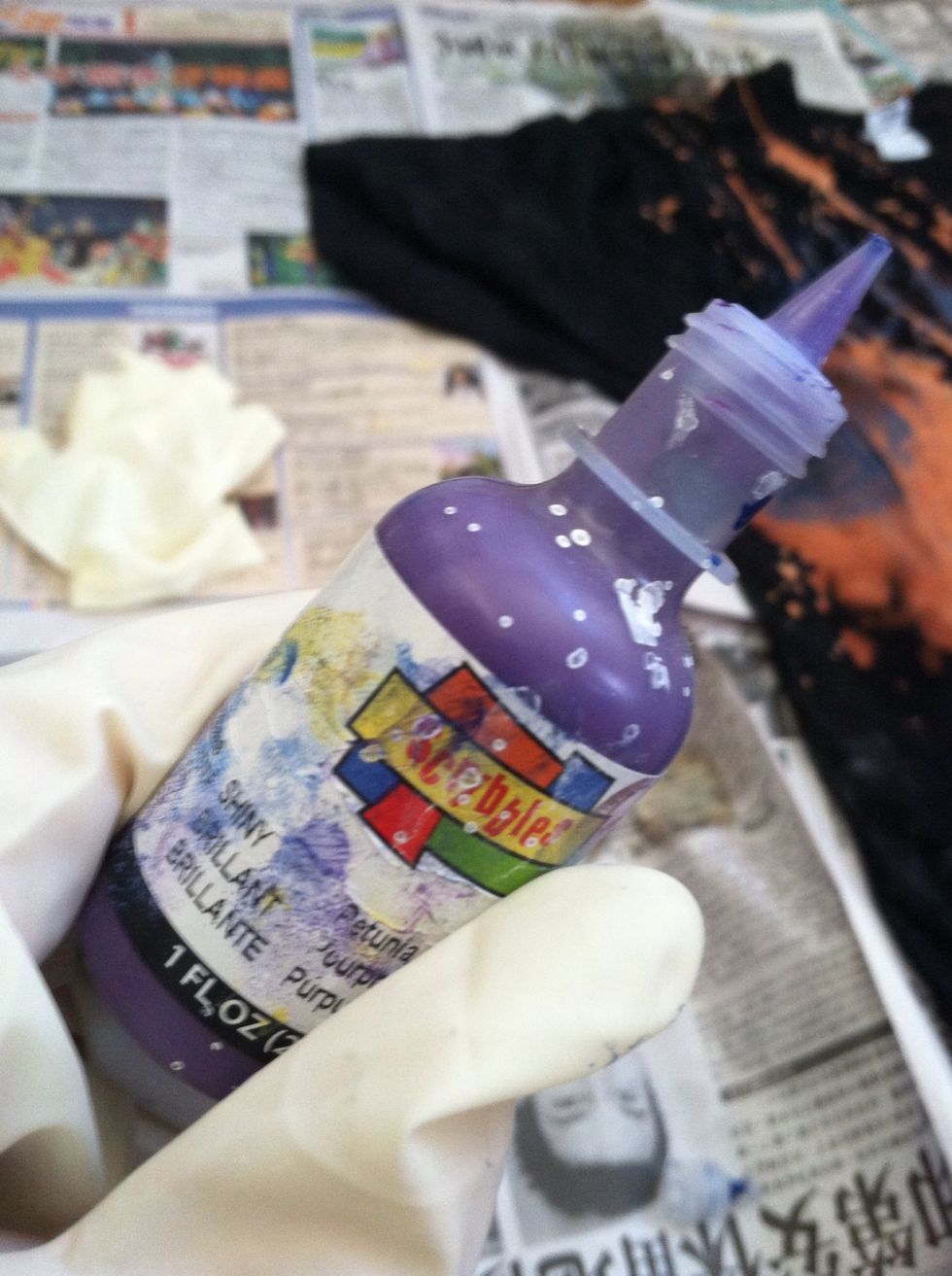 Take your purple fabric paint.