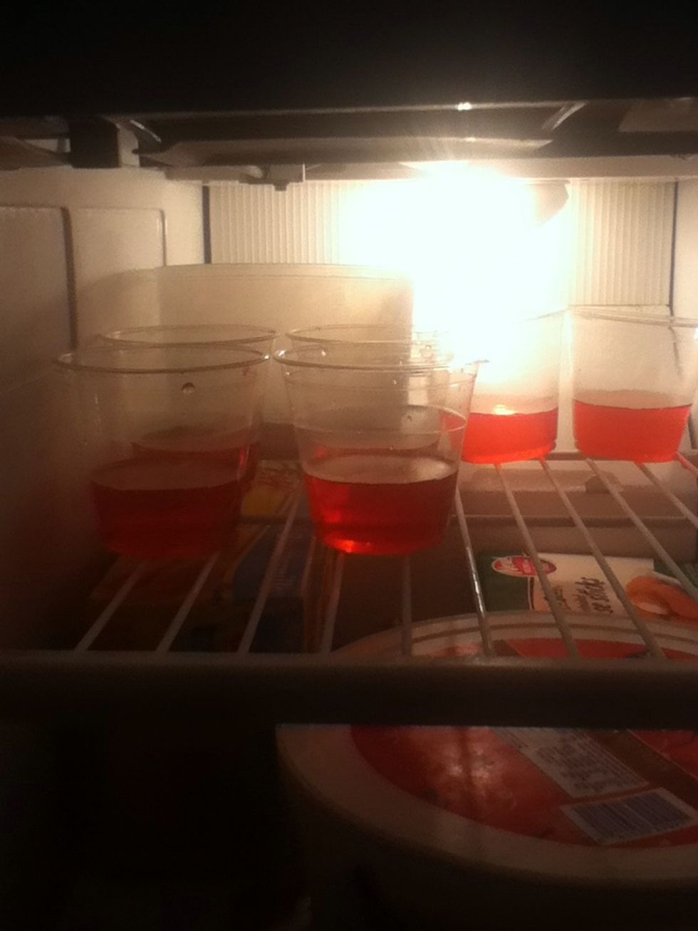 Take your red cool ade and make it as directed on the package. Then pour it into a little less than one third of the cups.