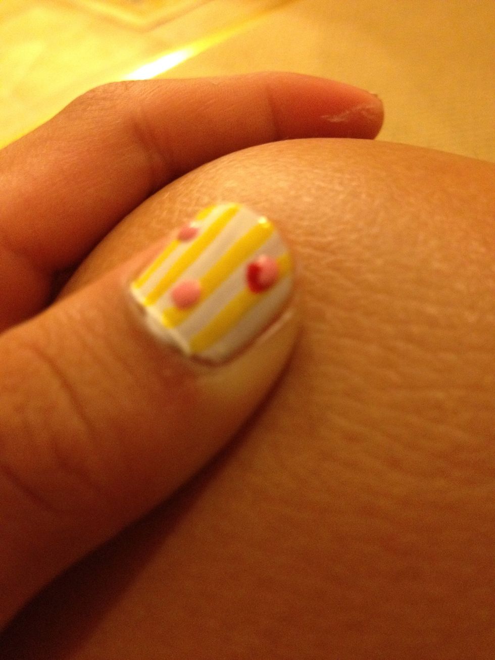 Take your red thin brush and SLOWLY paint the under part of the circle... The first petal