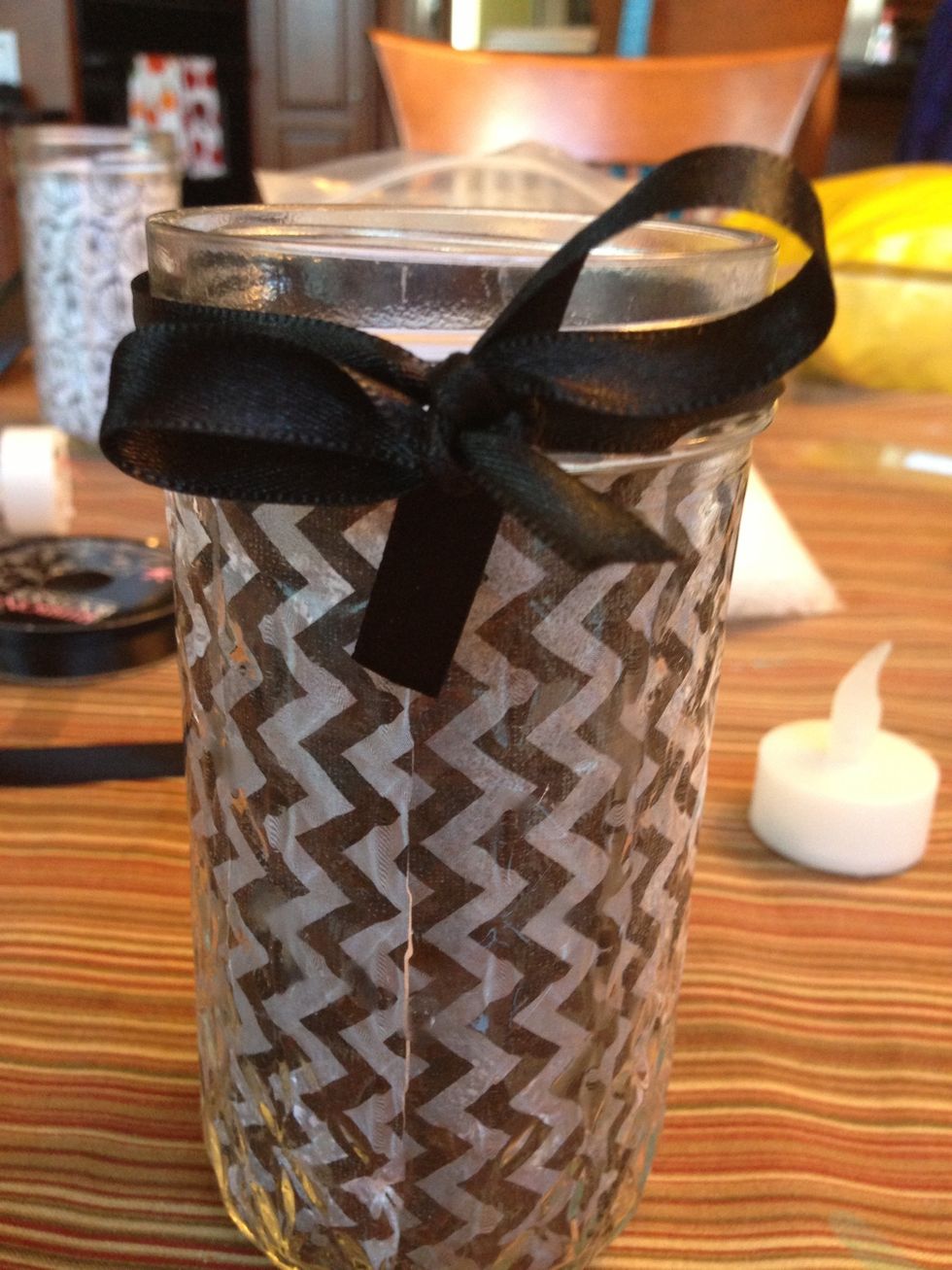 Take your ribbon and tie a bow around the top of the jar.
