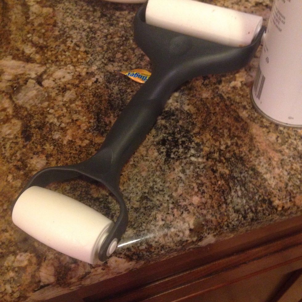 Take your roller and smash the Butterfinger into little pieces (if you use the bite size Butterfingers you'll need a few of them)