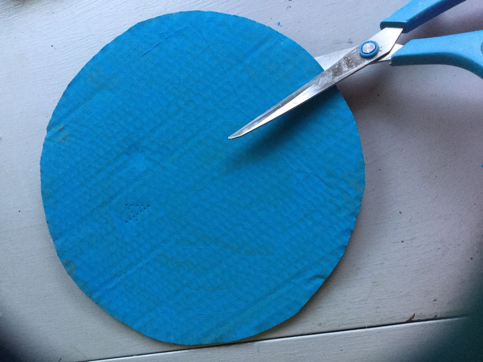 Take your scissors and cut slits on the lines that you made on the back of the cardboard, the slits should be about one inch deep