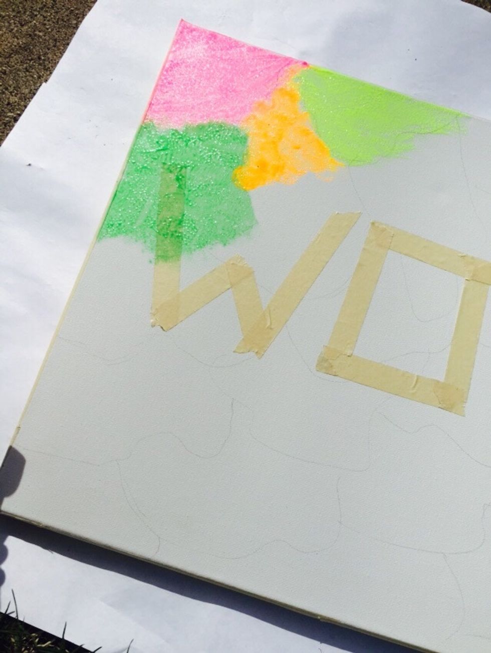 Take your sponge and lightly start to fill in your design.