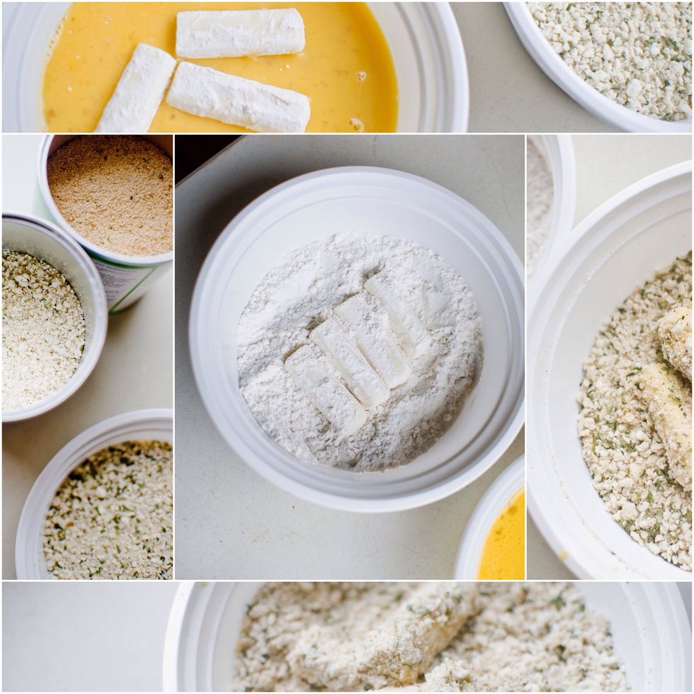 Take your sticks out the freezer now! Place sticks in flour. Roll them, until covered.