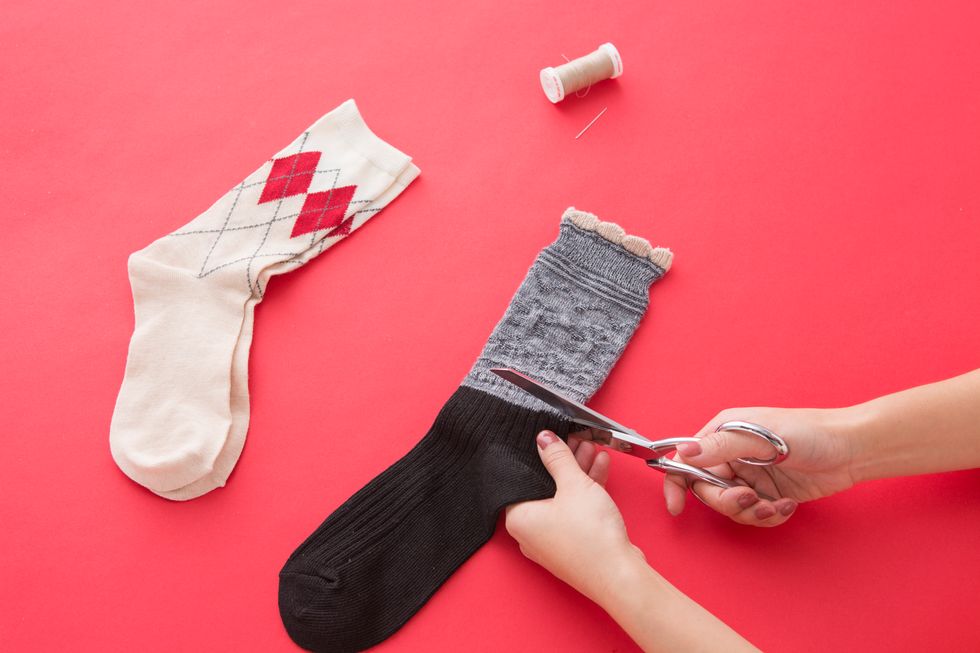 Take your textured sock and cut at the low ankle so that it forms a tube.