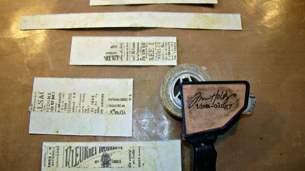 Taking scraps of scrapbook paper, cut different lengths and add washi tape, these will be mounted under your photos.