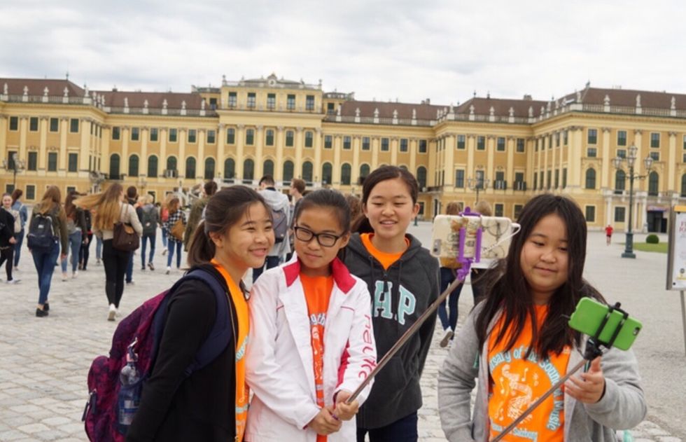 Taking selfies in front of a palace