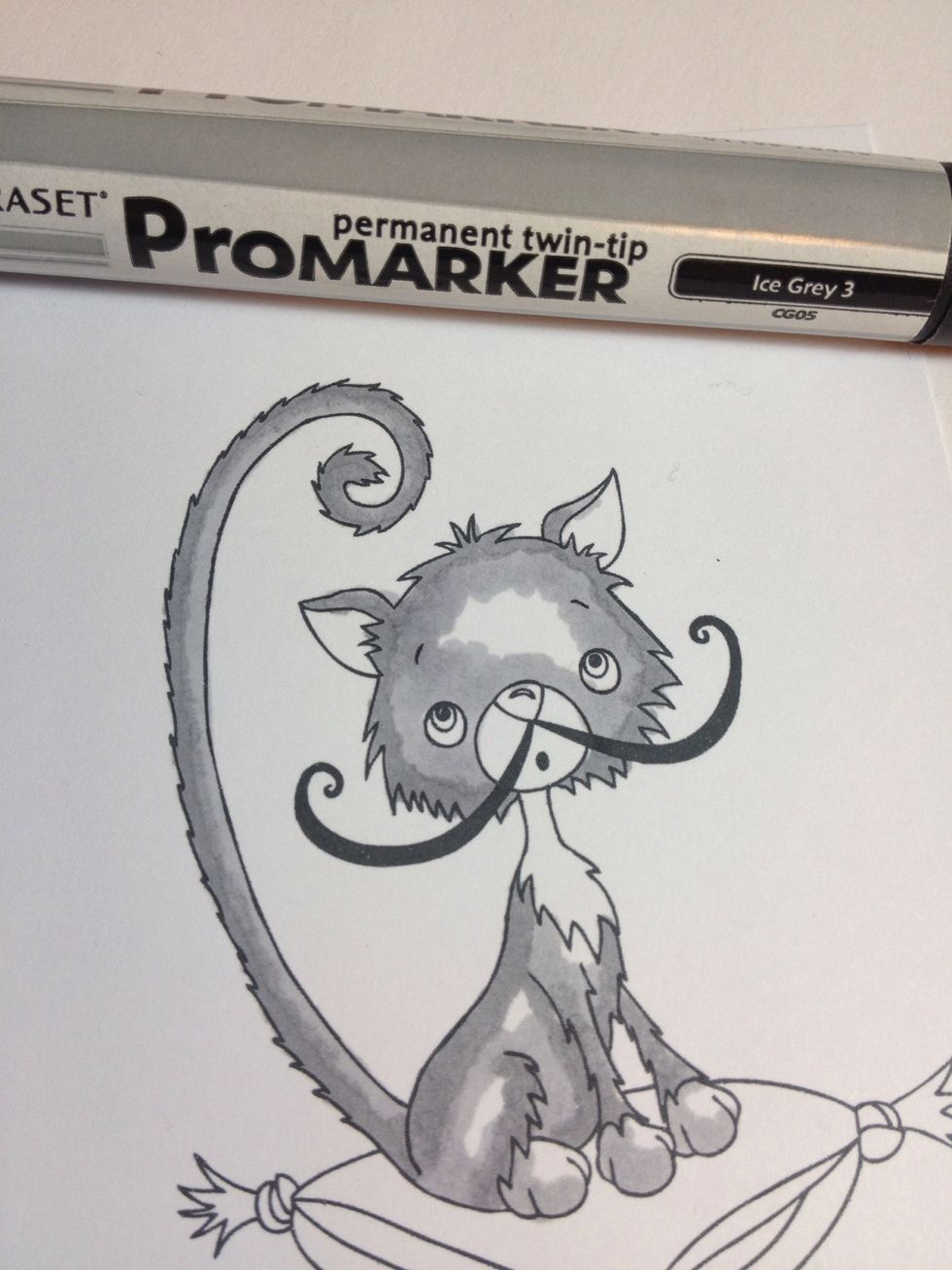 Taking the 2nd darkest colour (ice grey 3), colour in just over and next to the darker grey, don't worry about blending just yet but try to leave to some sections white