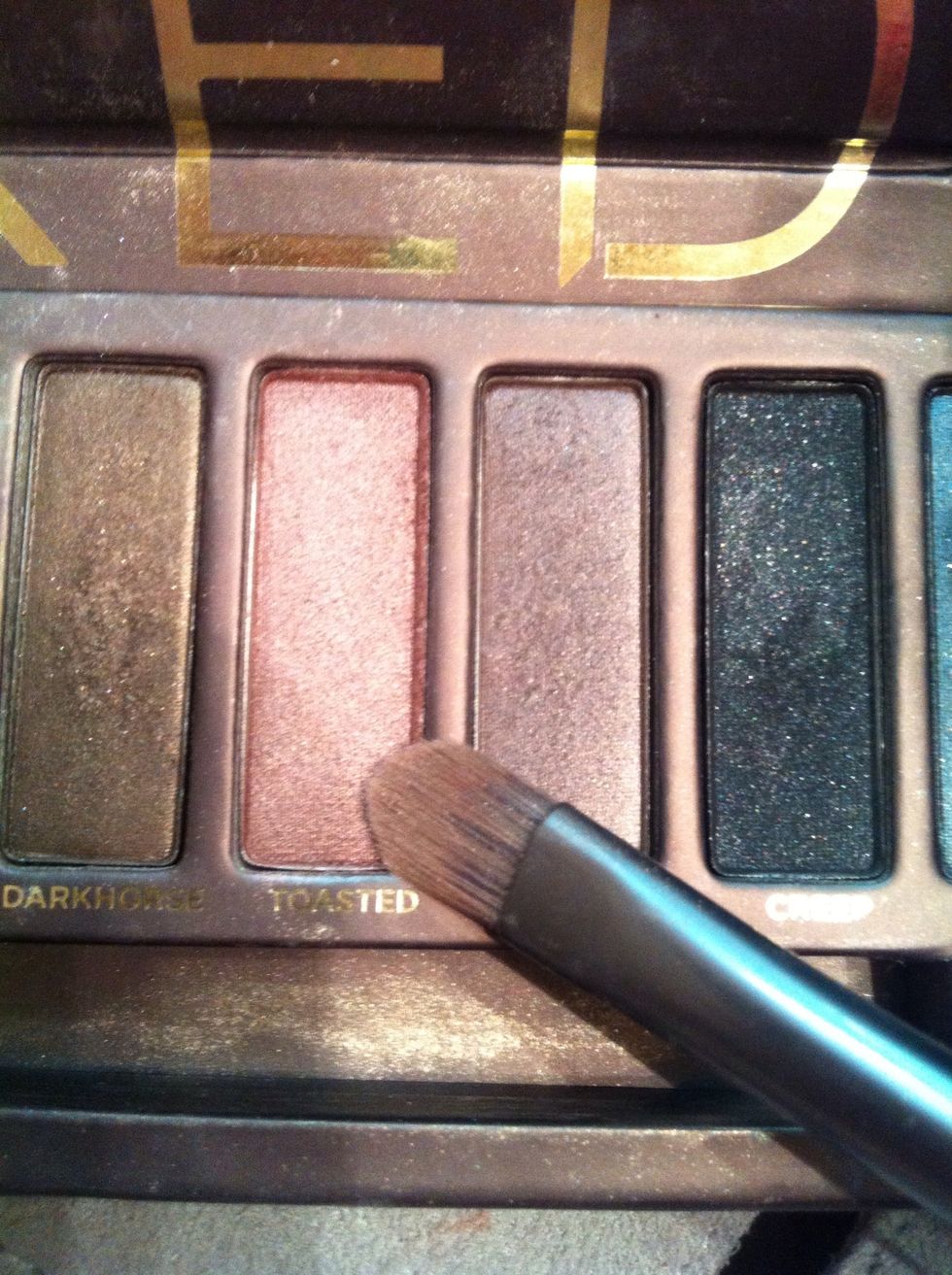 Taking the color toasted or any other dark rosey color apply it to the crease of your eye.