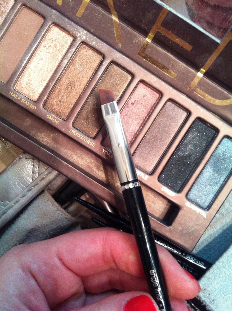 Taking the same color apply it to your lower lash line using an angled brush