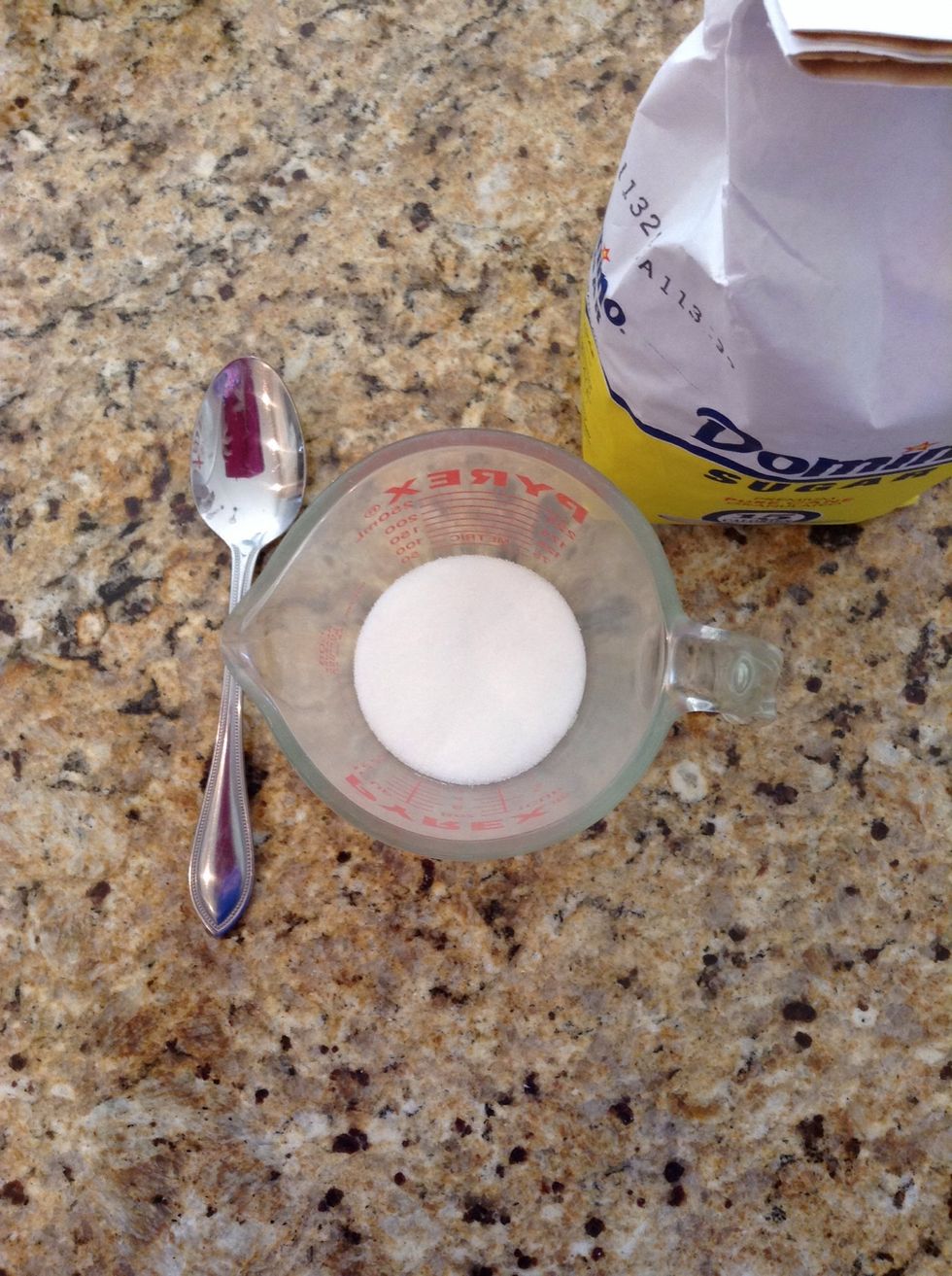 Taking your sugar, pour up to 5 tablespoons of sugar into your measuring cup. It depends on how much glitter polish you want to decide how much sugar you need. Just know a little goes a long way.