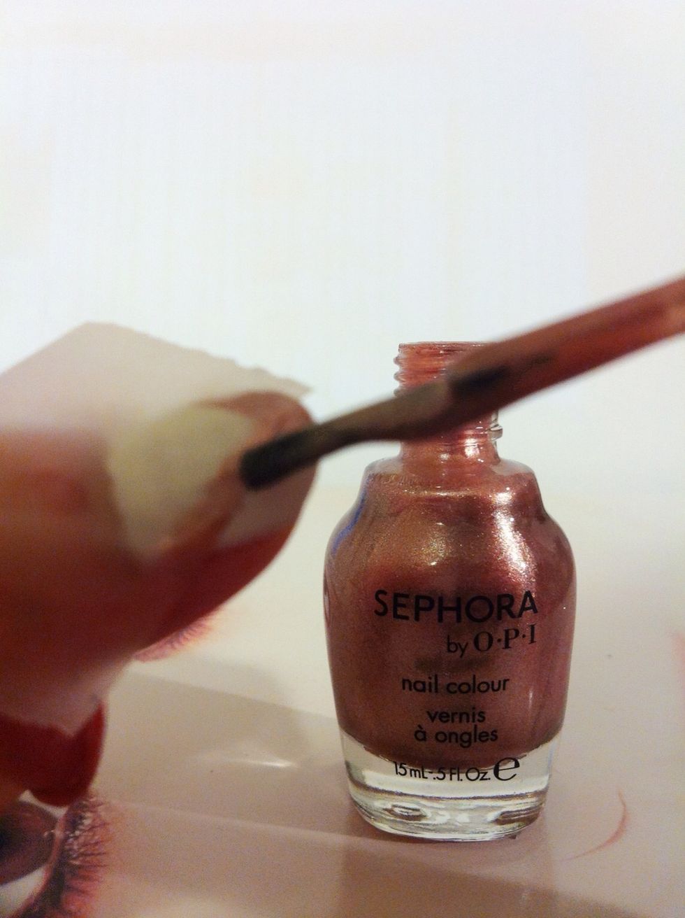 Tap again on the your dried nail, and it should be symmetric to the one you just did. And let it sits until dry.