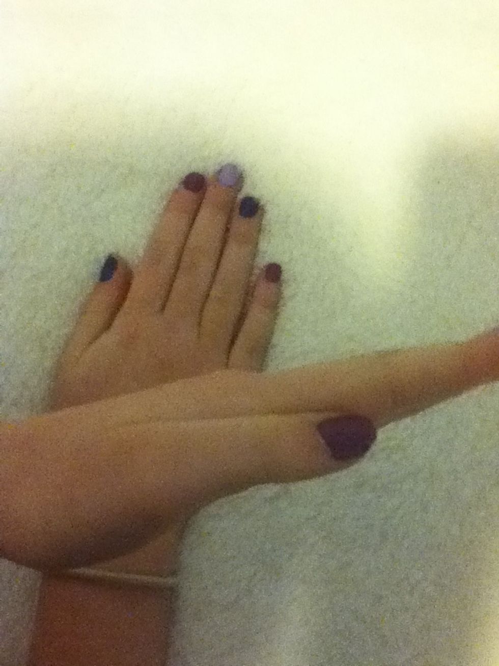 Tap and cross other hand