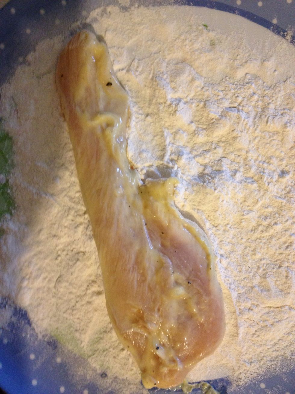 Tap chicken in flour