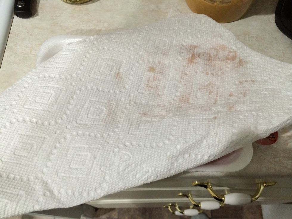 Tap dry with paper towels on both sides