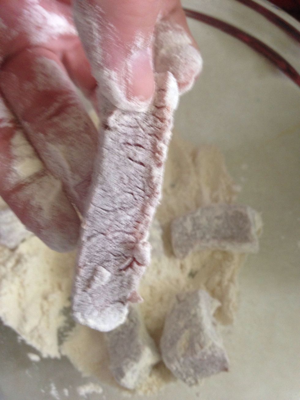 Tap extra flour off
