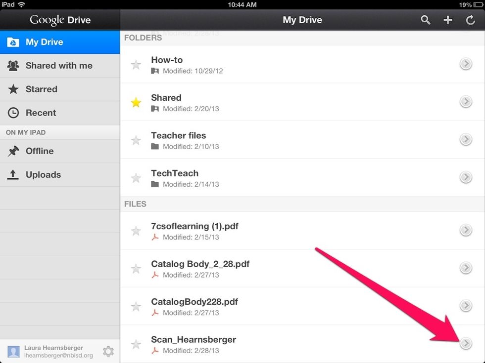 Tap the arrow next to the file you want to move.