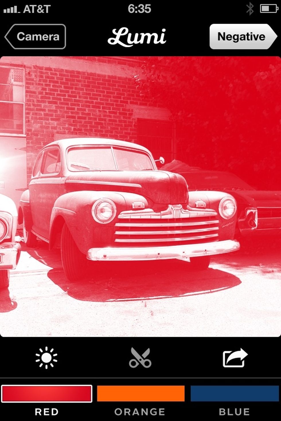 Tap the color buttons at the bottom to preview what your print will look like in red, orange or blue.