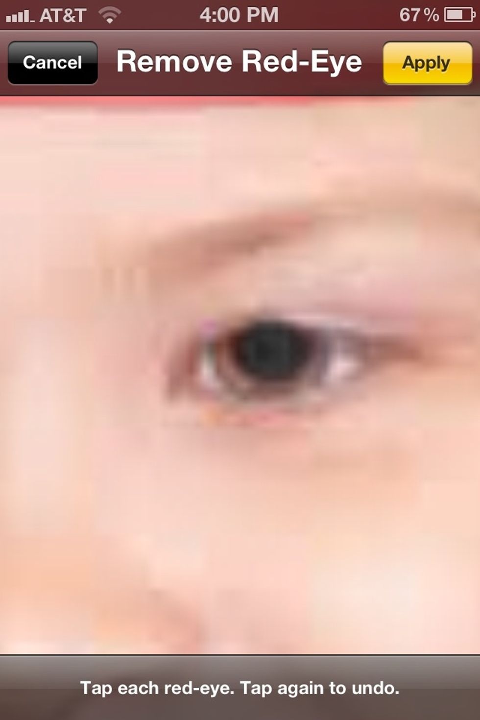 Tap the red portion of the eye. Repeat with the other eye. To undo a tap just tap it again.