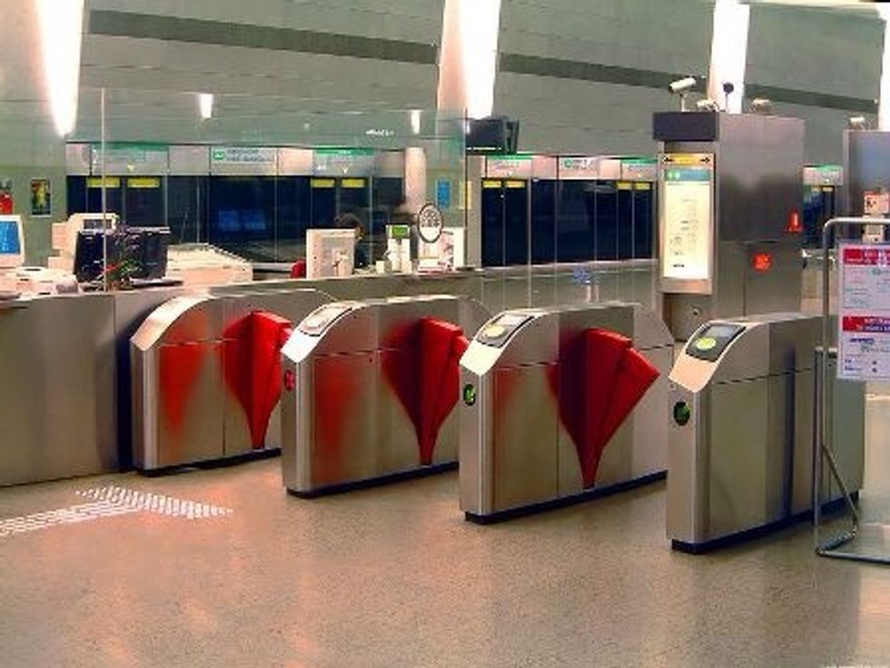 Tap your ticket card at the gantry. The gate will open to allow you to enter the platform. Wait for the train to come and board the train towards Joo Koon, alighting at Tanah Merah Interchange