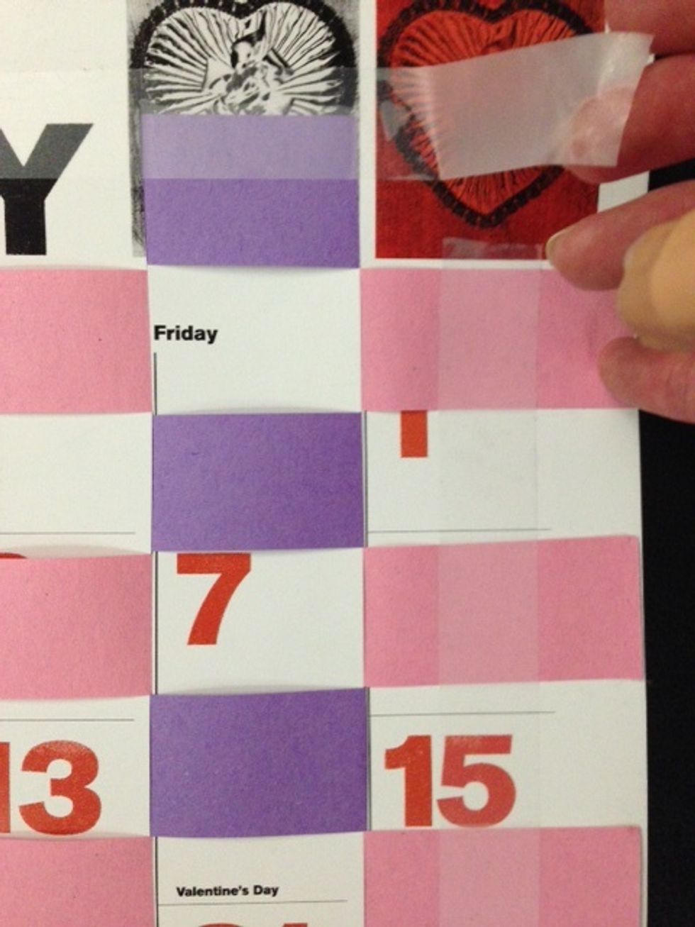 Tape a frame around the edges to secure the weaving. Make sure this is on the back!