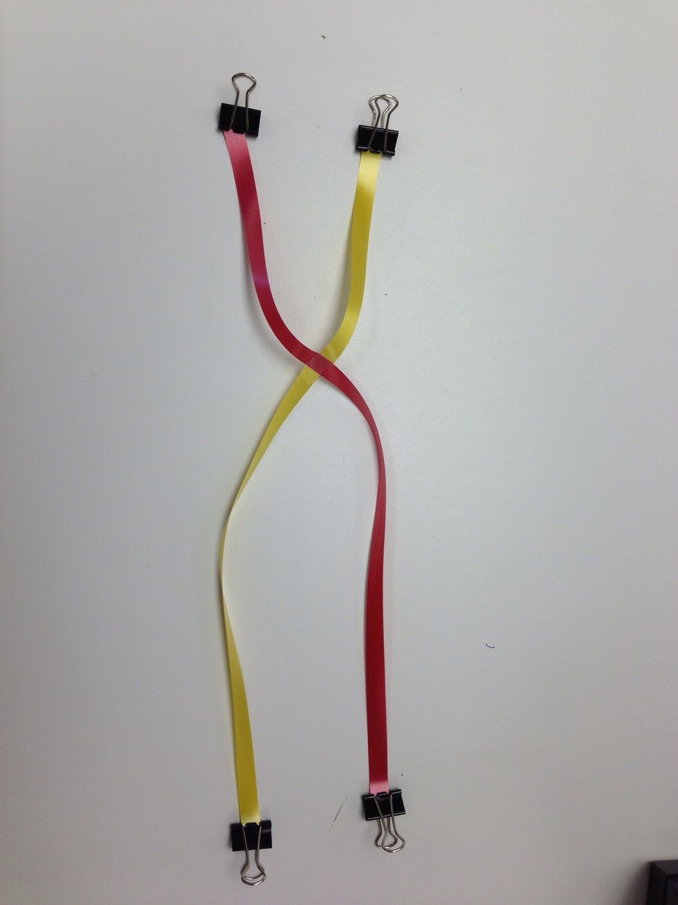 Tape at fold perpendicular. Note that the red is on top of yellow.