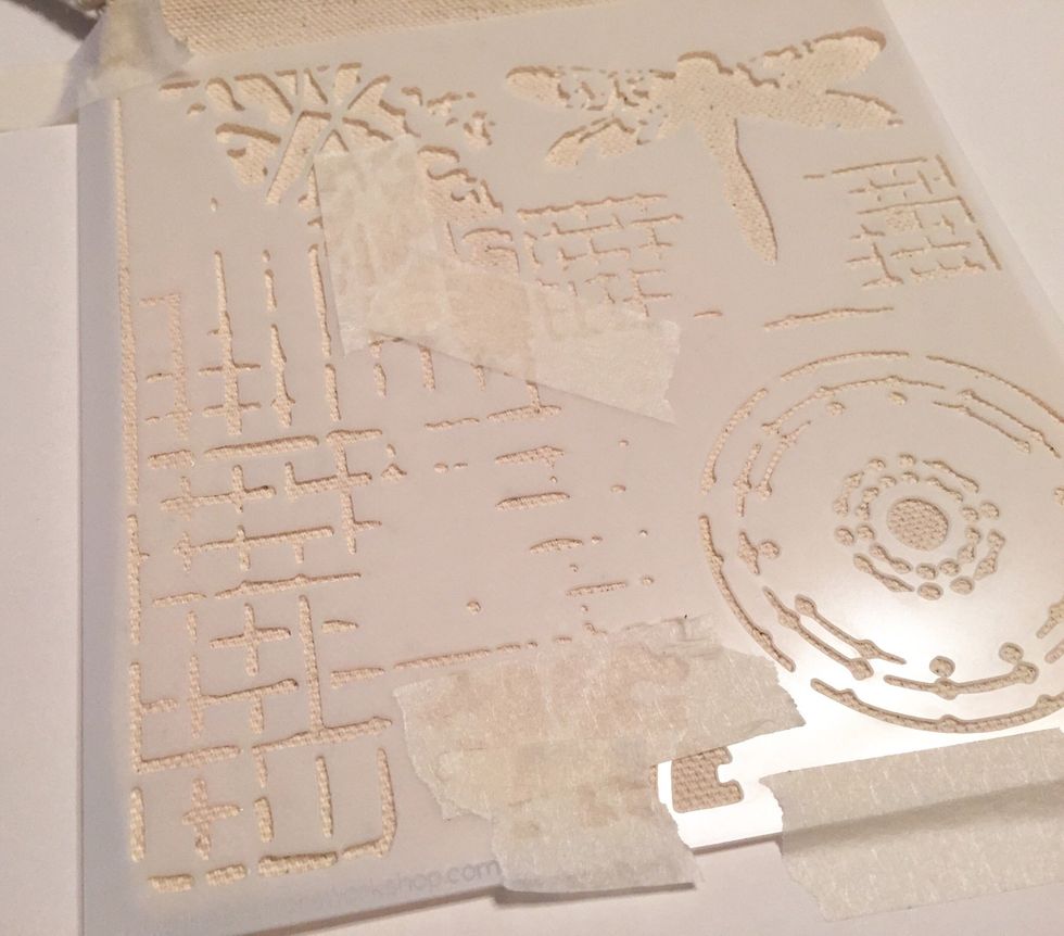 tape bag down to work surface, then tape Screen Print stencil to bag with grid pattern at bottom left. also tape off any portions of the design that you don't want inked.