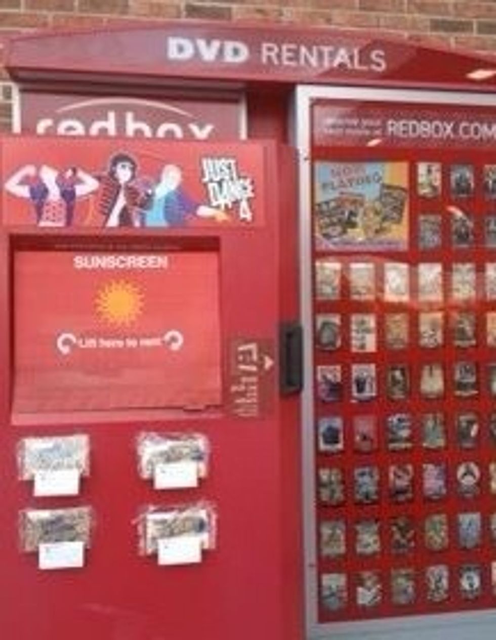 Tape bags of popcorn to a Redbox kiosk.
