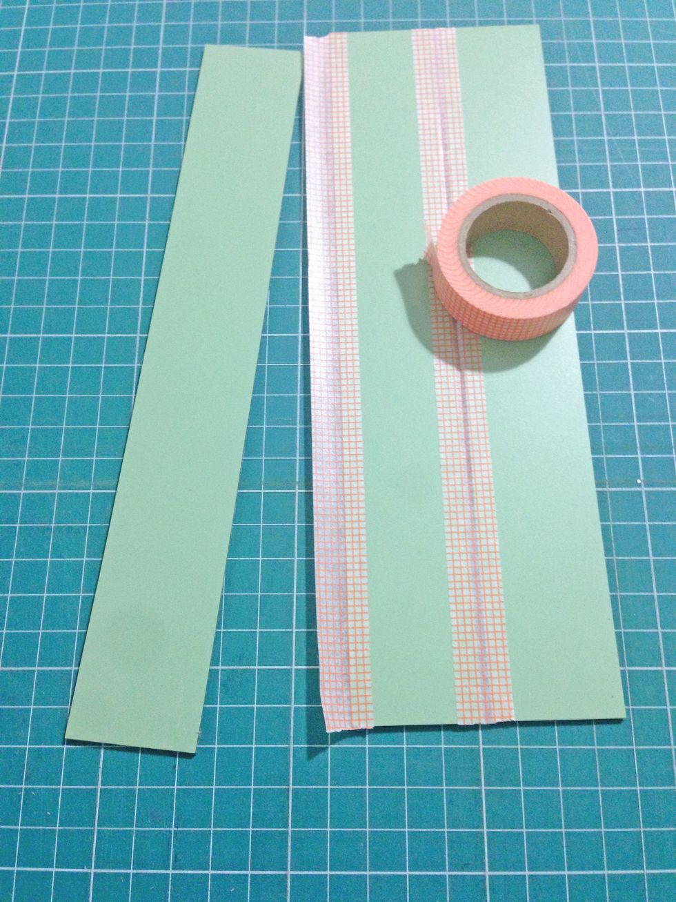 Tape down on the other side of the mirror as shown...