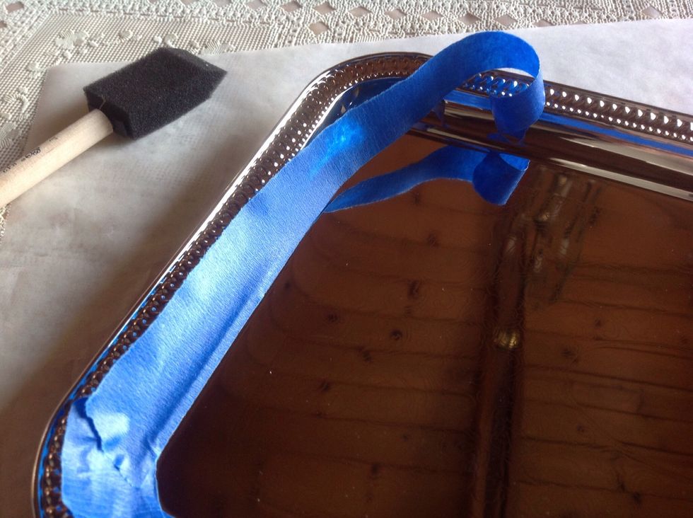 Tape down the perimeter of your tray.  Be very careful to keep the tape straight.  Firmly rub tape down, you do not want any paint seeping underneath.