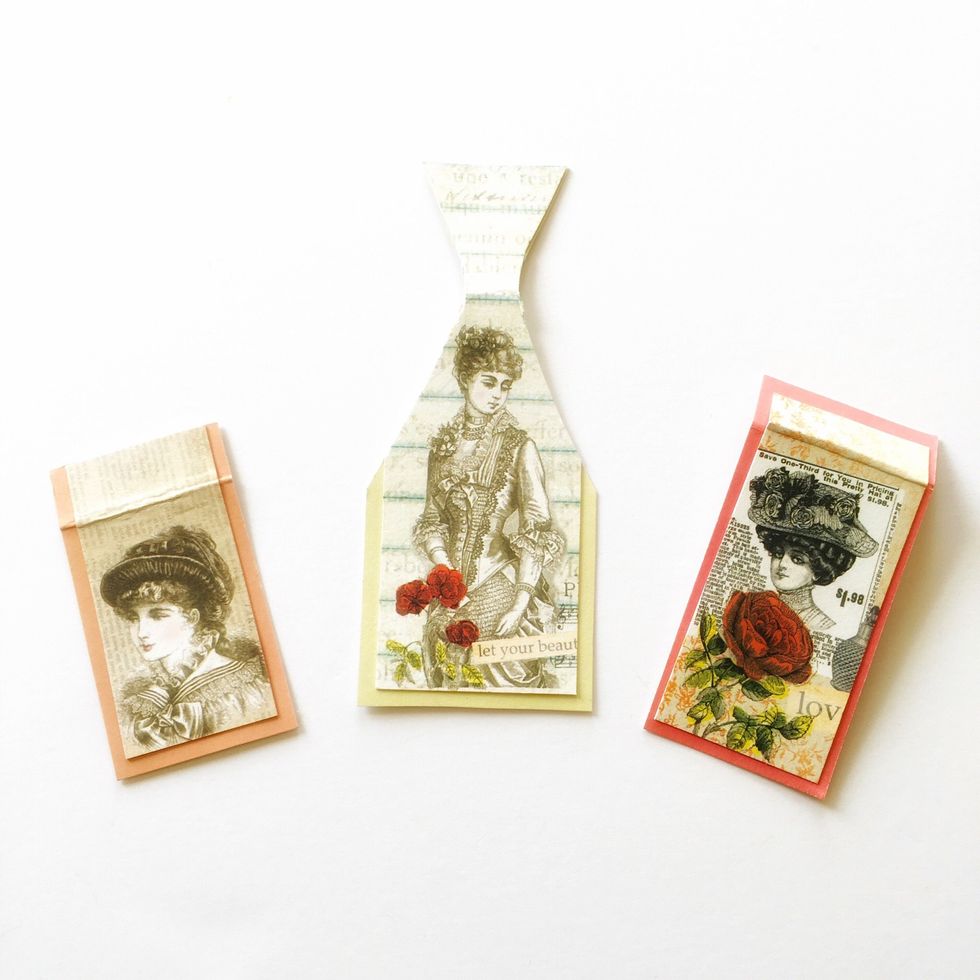 Tape image to base paper and fold or score where the paper will bend over the clip.