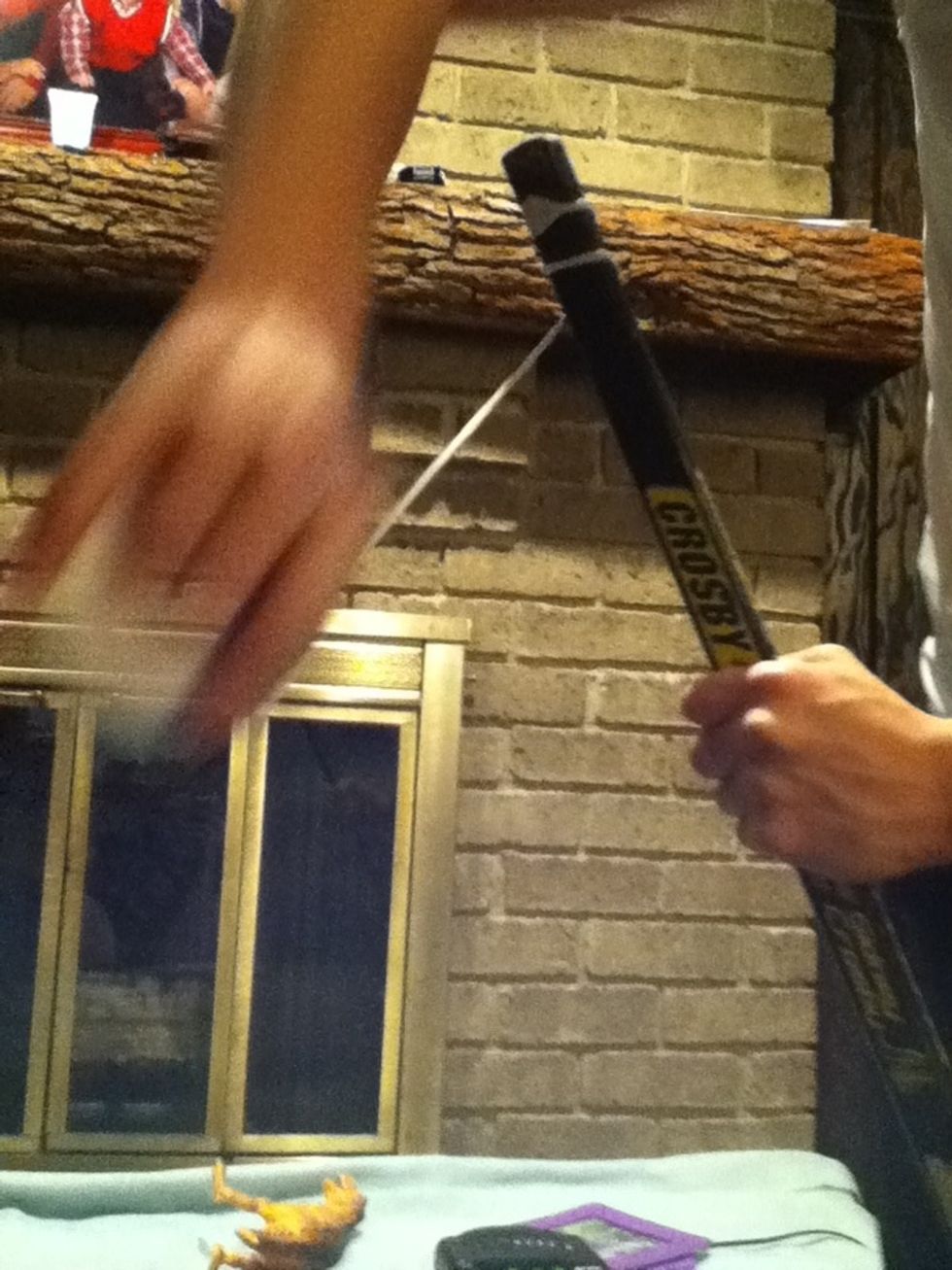 Tape it around the stick
