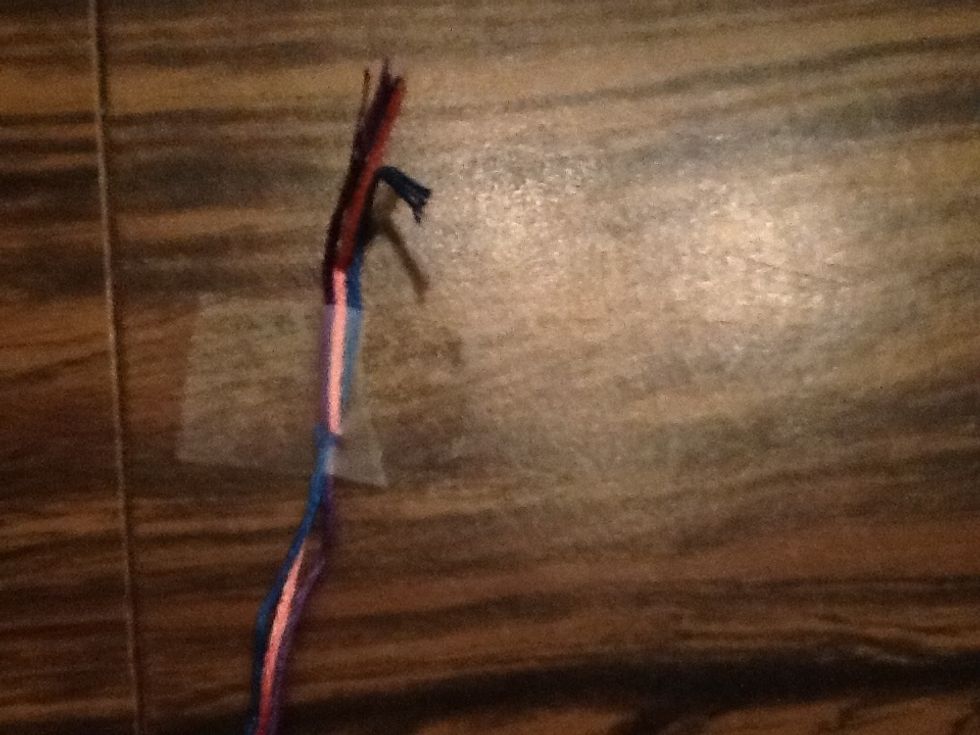 Tape it to the table like this.