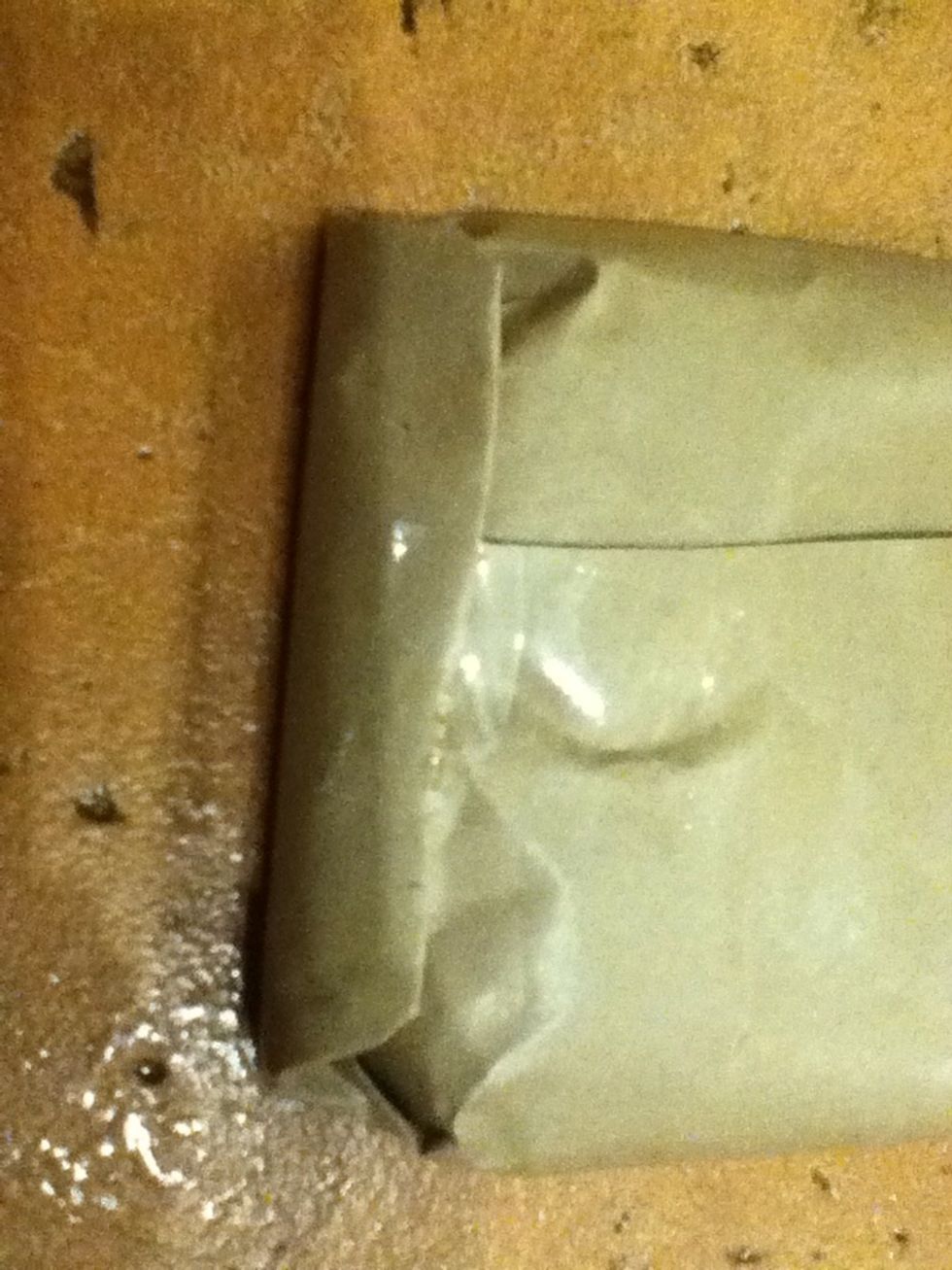 Tape it up at the side as shown.