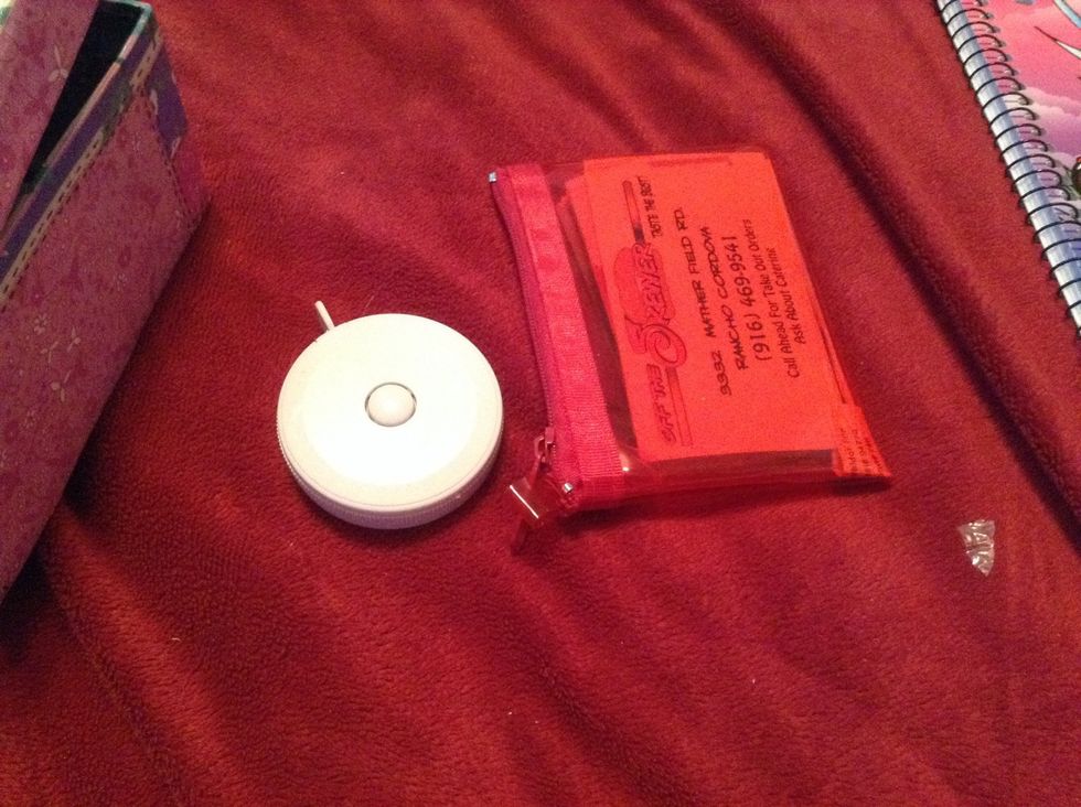 Tape measure- craft drawer. Business cards- business card binder.